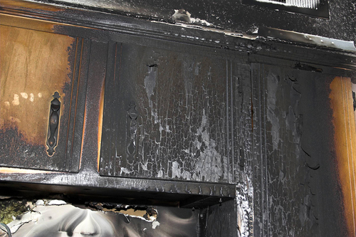 fire and smoke damaged kitchen cabinets