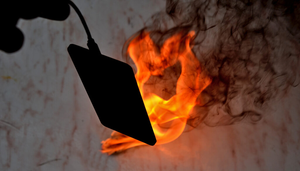 fire and smoke damaged electronic device